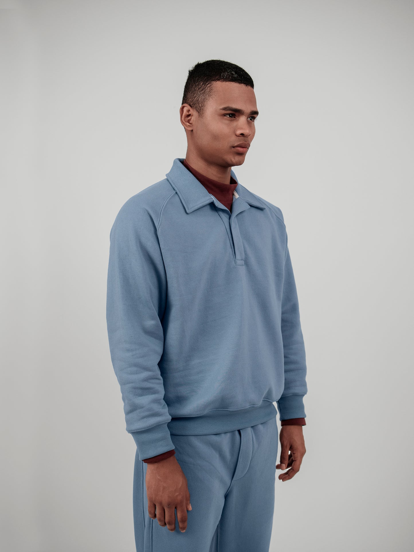 Polera cuello camisa - celeste