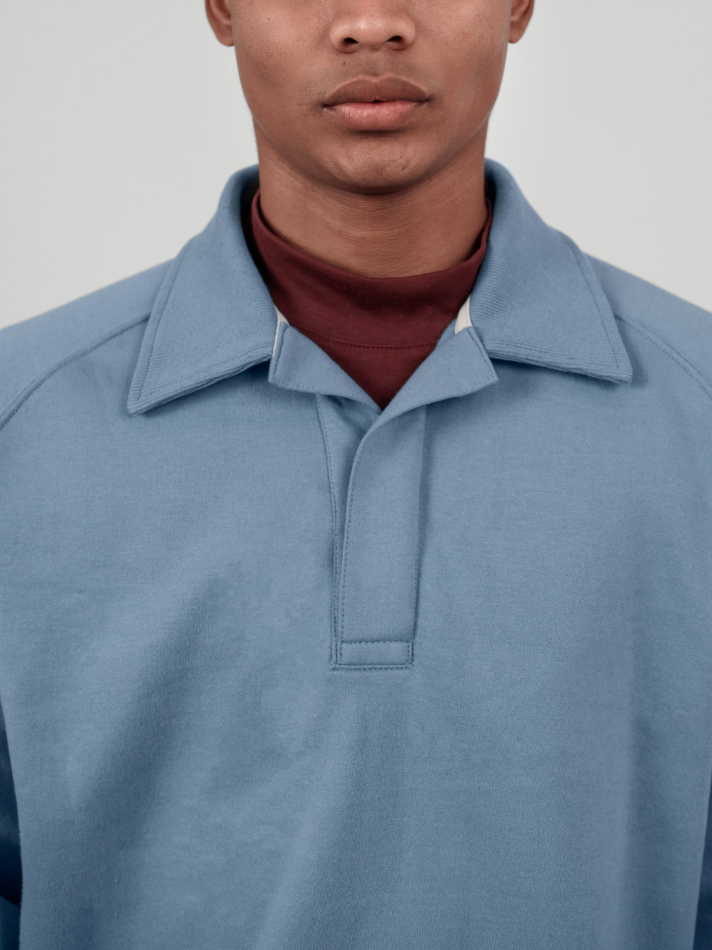 Polera cuello camisa - celeste